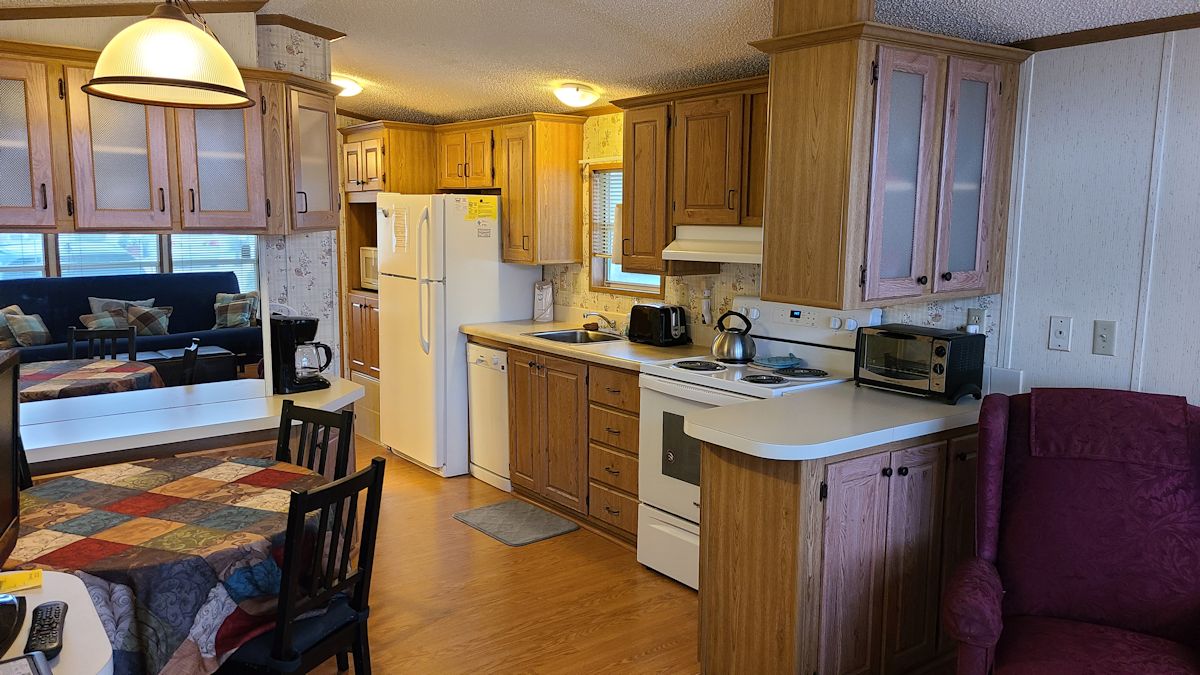 Dining area adjacent to kitchen and living room.